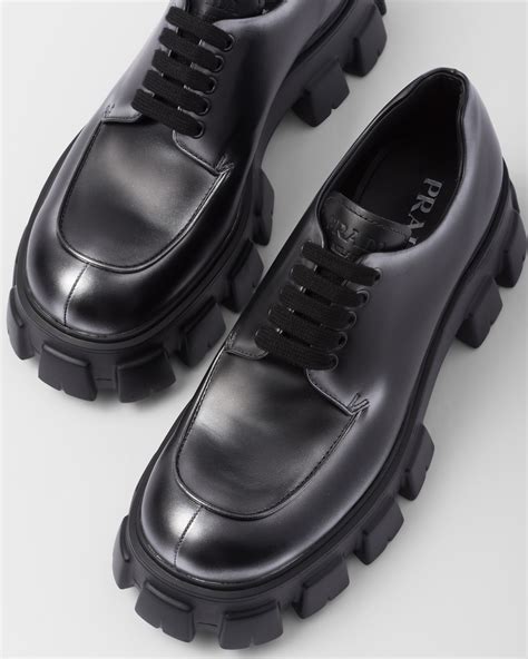 prada lace up sneakers|Prada brushed leather laced booties.